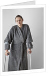Woman on crutches by Anonymous