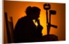 Woman seated with crutches by Anonymous