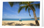 Vacationing couple's beach chair and umbrella on Hulupo'e Beach; Manele Bay; Lanai; Hawaii by Anonymous