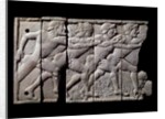 Ivory plaque with relief depicting athletes racing by Anonymous