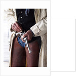 Cowboy Loading Gun by Anonymous