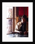 Cowboy with rifle and Cowgirl looking over his shoulder by Anonymous