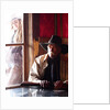 Cowboy with rifle and Cowgirl looking over his shoulder by Anonymous