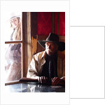 Cowboy with rifle and Cowgirl looking over his shoulder by Anonymous