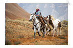 Cowgirl at Full Gallop with Horses in tow by Anonymous