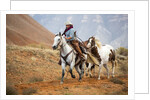 Cowgirl at Full Gallop with Horses in tow by Anonymous