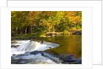 Trees reflect in cascade above Bond Falls on the Middle Fork of the Ontonagon river near Paulding in by Anonymous