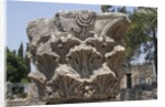 Hebrew menorah carved into stone capital in Roman town of Capernaum by Anonymous