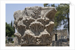Hebrew menorah carved into stone capital in Roman town of Capernaum by Anonymous