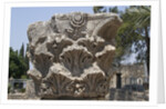 Hebrew menorah carved into stone capital in Roman town of Capernaum by Anonymous