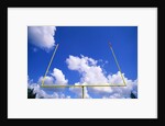 Football Goal Posts Against Sky by Anonymous