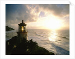 Lighthouse Overlooking Sunset by Anonymous