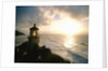Lighthouse Overlooking Sunset by Anonymous