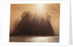 Sun Beams Breaking through Fog over Sea Stack by Anonymous