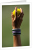 Hand of a Wimbledon Ball Boy Holding a Tennis Ball by Anonymous