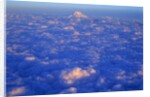 The Snowy Peak of Mount Rainier Rises Above the Clouds by Anonymous