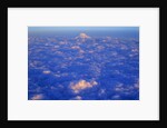 The Snowy Peak of Mount Rainier Rises Above the Clouds by Anonymous