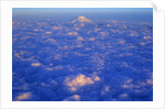 The Snowy Peak of Mount Rainier Rises Above the Clouds by Anonymous