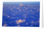 The Snowy Peak of Mount Rainier Rises Above the Clouds by Anonymous
