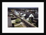 Houses Lining Empty Suburban Streets by Anonymous