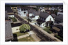 Houses Lining Empty Suburban Streets by Anonymous