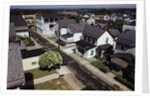 Houses Lining Empty Suburban Streets by Anonymous
