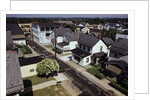 Houses Lining Empty Suburban Streets by Anonymous