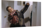 Boy Putting on His Jacket by Anonymous