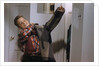 Boy Putting on His Jacket by Anonymous