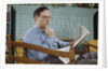 Pensive Man Reading Newspaper in Living Room by Anonymous