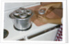 Woman Sterilizing Jars for Canning by Anonymous