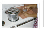 Woman Sterilizing Jars for Canning by Anonymous