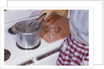 Woman Sterilizing Jars for Canning by Anonymous