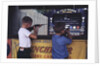 Children Firing Air Rifles at Fair Booth by Anonymous