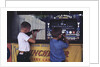 Children Firing Air Rifles at Fair Booth by Anonymous