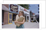 Girl Carrying Paper Shopping Bags by Anonymous
