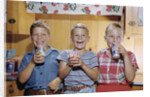 Happy Children Enjoying Glass of Cold Milk by Anonymous