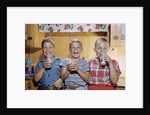 Happy Children Enjoying Glass of Cold Milk by Anonymous