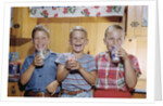 Happy Children Enjoying Glass of Cold Milk by Anonymous