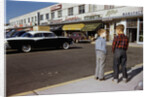 Boys Standing Alongside Strip Mall Parking Lot by Anonymous