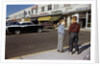 Boys Standing Alongside Strip Mall Parking Lot by Anonymous
