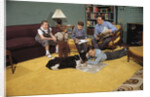 Family Sitting Around Living Room by Anonymous