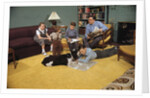 Family Sitting Around Living Room by Anonymous