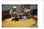 Family Sitting Around Living Room by Anonymous