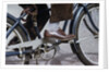 Man Riding Bicycle in Dress Shoes by Anonymous