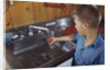 Boy Getting Glass of Tap Water by Anonymous