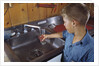 Boy Getting Glass of Tap Water by Anonymous
