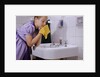 Girl Washing Her Face at Sink by Anonymous