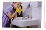 Girl Washing Her Face at Sink by Anonymous