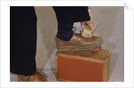 Man Buffing His Shoes by Anonymous